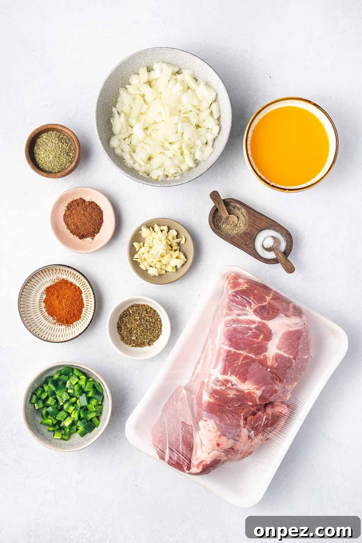 Ingredients needed to make slow cooker carnitas.