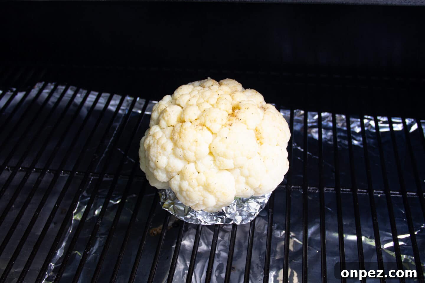 Smoked Cauliflower: How to Achieve Smoky, Tender Flavor 7 Picture of cauliflower on the smoker.