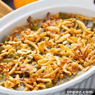 Slow cooker green bean casserole in a dish.