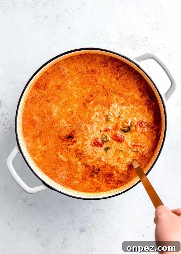 creamy chicken poblano soup in a pot