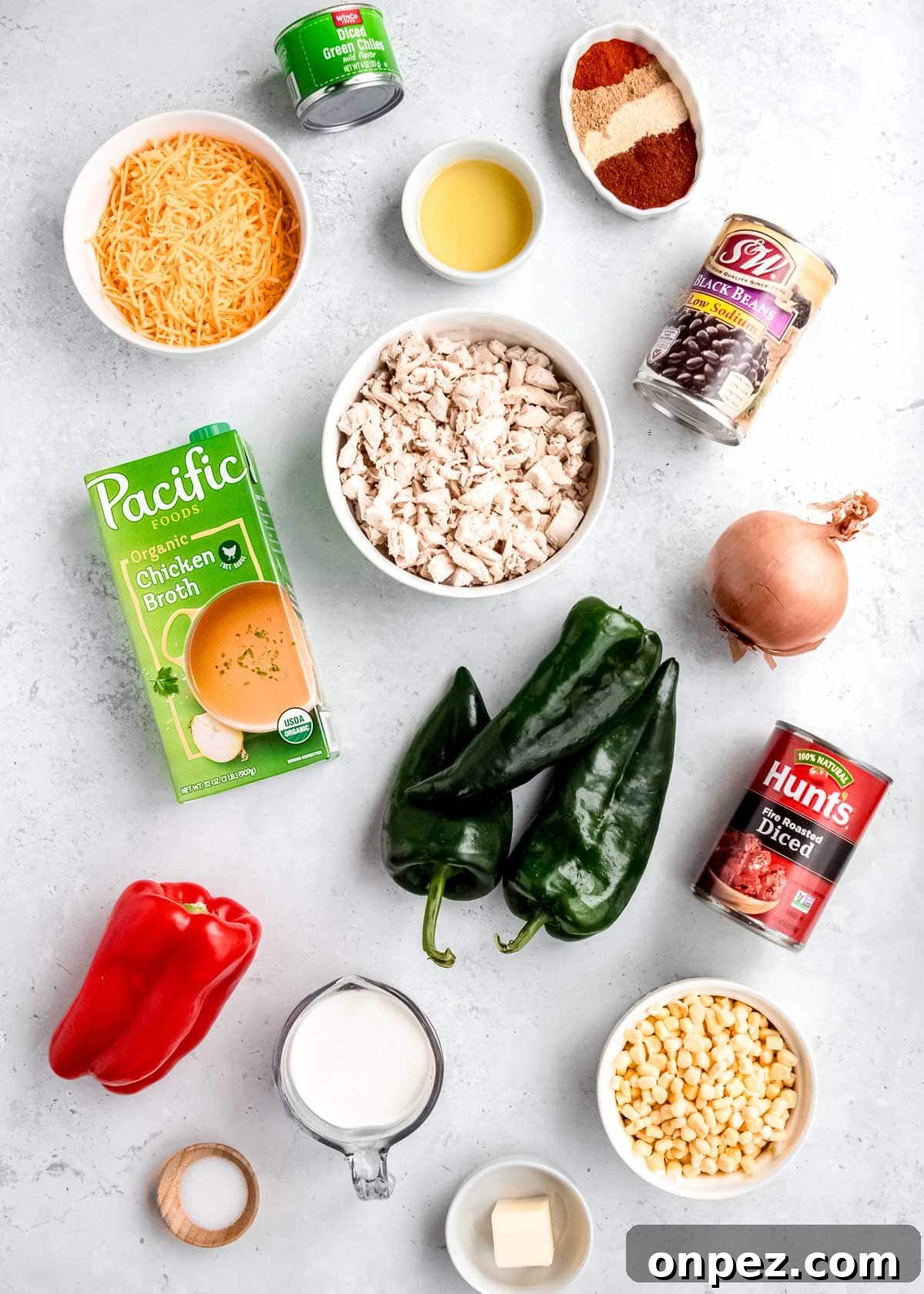 chicken poblano soup ingredients on a white table