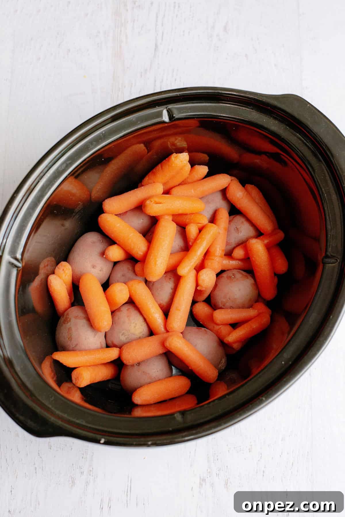 Slow Cooker One-Pot Chicken Dinner Recipe 6 pour your baby carrots over the potatoes