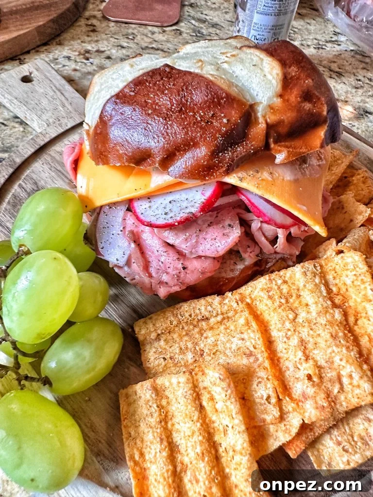 Deli Style Roast Beef Recipe for Tender Sliced Sandwiches 6 A roast beef sandwich with grapes and Doritos