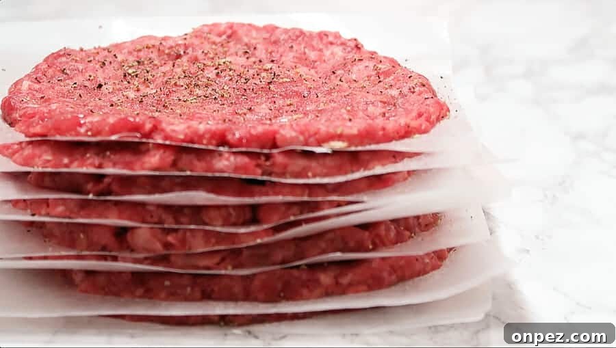 In-N-Out Double-Double Animal Style Copycat Recipe 16 Stack of beef patties between wax paper