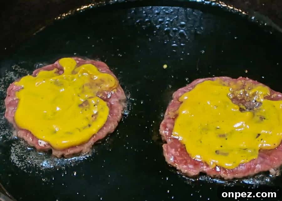 In-N-Out Double-Double Animal Style Copycat Recipe 18 Adding mustard to beef patties for Animal Style burgers