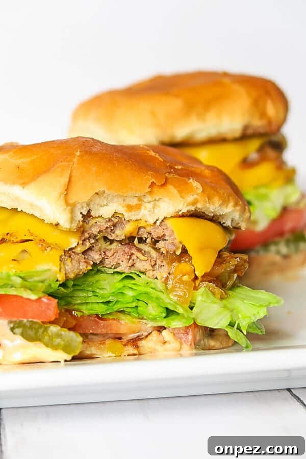 In-N-Out Double-Double Animal Style Copycat Recipe 4 Bite shot of an In-N-Out copycat Double-Double Animal Style burger