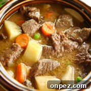 Hearty beef stew made in the crockpot or on the stovetop with tender beef and vegetables.