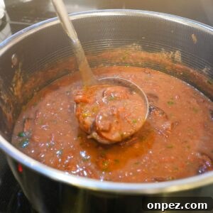 Authentic New Orleans Red Beans and Rice 6 Red beans and sausage in a pot.