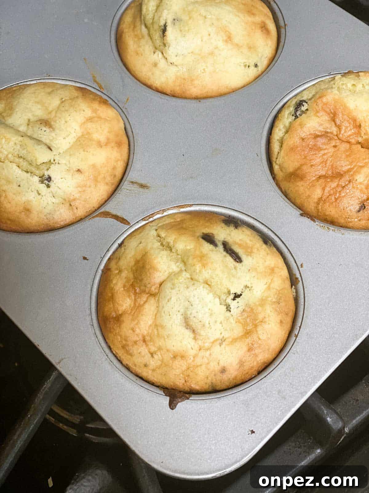 Gluten-Free Banana Protein Muffins Recipe 3 protein muffins in muffin tin