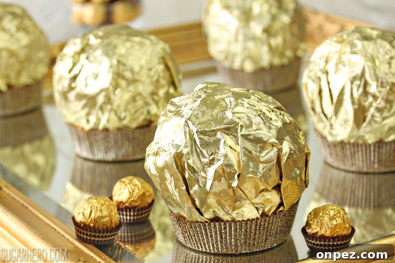 Giant Ferrero Rocher Hazelnut Mousse Cakes - full of chocolate cake and hazelnut mousse! | From SugarHero.com