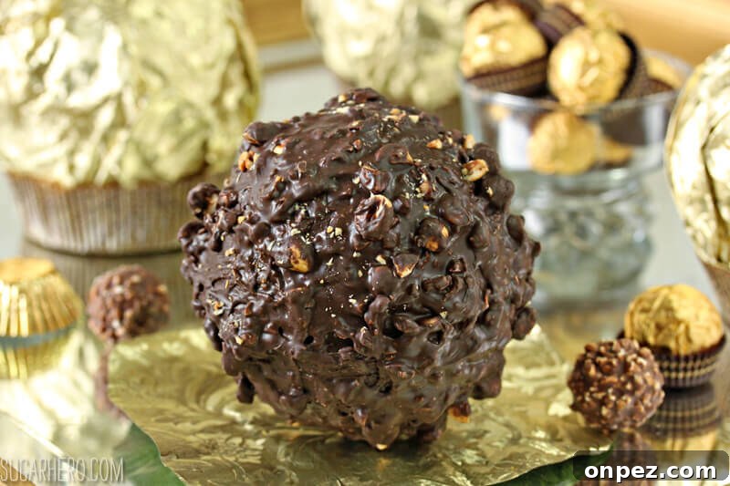Giant Ferrero Rocher Hazelnut Mousse Cakes - full of chocolate cake and hazelnut mousse! | From SugarHero.com