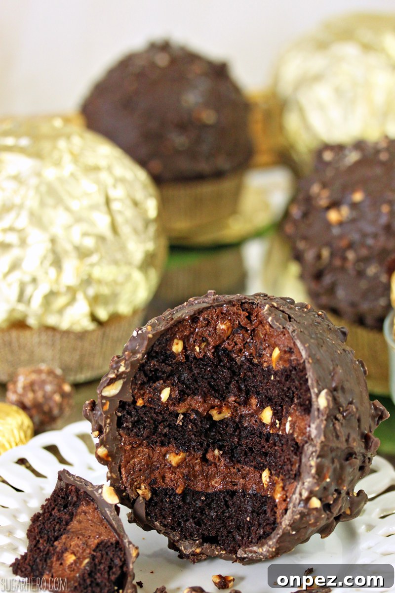 Giant Ferrero Rocher Hazelnut Mousse Cakes - full of chocolate cake and hazelnut mousse! | From SugarHero.com