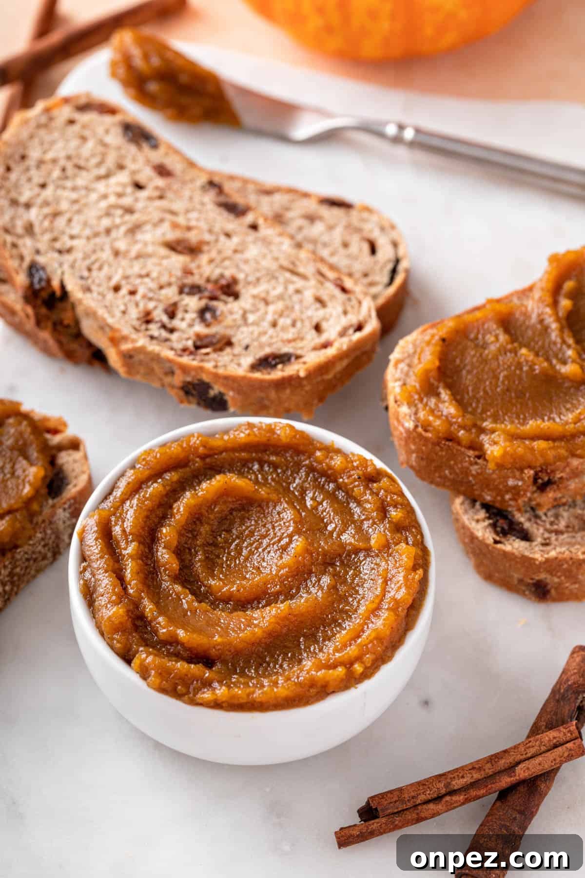 a white bowl of pumpkin butter