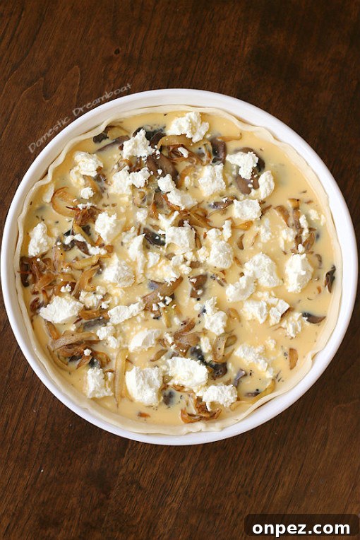 Caramelized Onion and Sauteed Mushroom Quiche before baking.