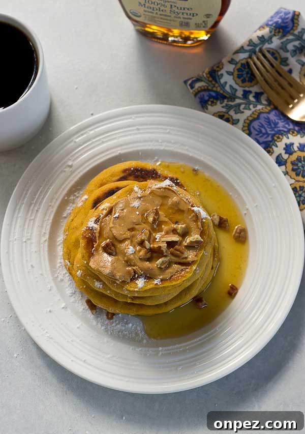 A plate of Peanut Butter Pumpkin Pancakes ready to eat.