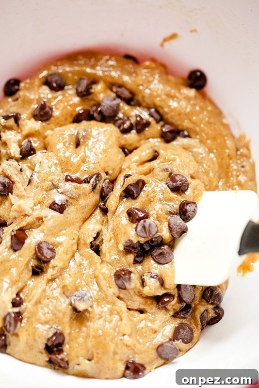 These Gluten-free Chocolate Cookie Bars are deliciously chewy and dairy-free too! This is a perfect quick and easy recipe when you don't have a lot of time but are craving a sweet treat! They're so easy, kids will love helping you bake too!
