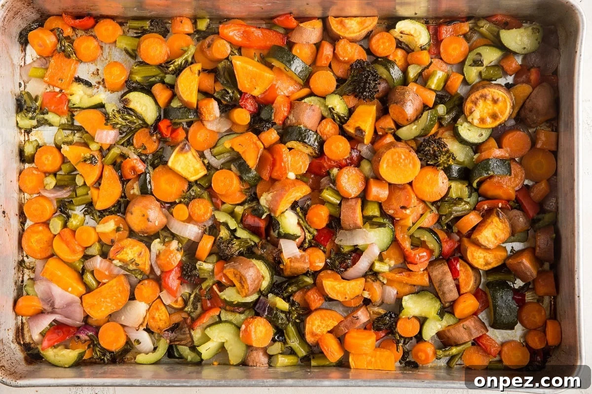 horizontal photo of roasted vegetables right out of the oven.