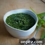 Homemade Mint Sauce Recipe for Lamb and Roasts 9 Small heart shaped white bowl filled with homemade mint sauce
