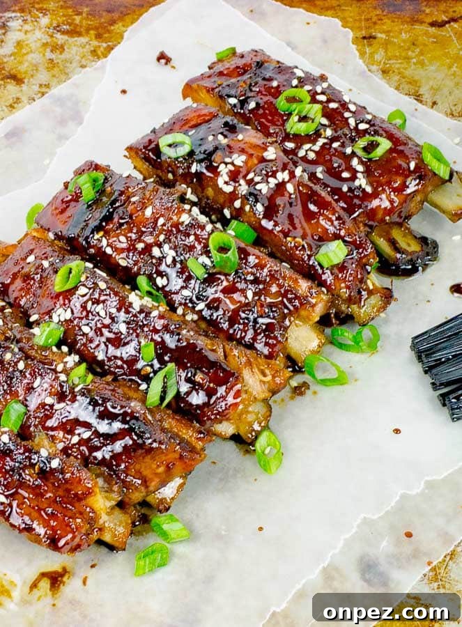 Sticky Asian Baked Pork Ribs Recipe 2 Sticky Asian Baked Pork Ribs shown diagonally