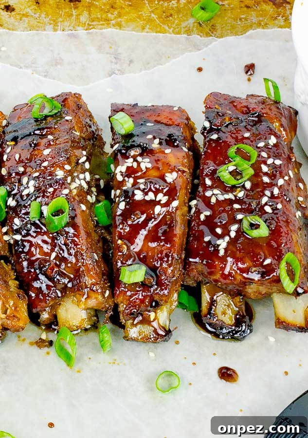 Sticky Asian Baked Pork Ribs Recipe 6 three Sticky Asian Baked Pork Ribs on baking sheet