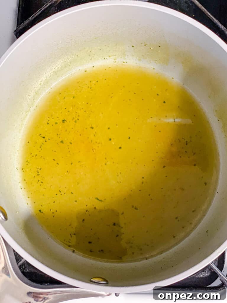 process shot of veggie broth boiling in pot