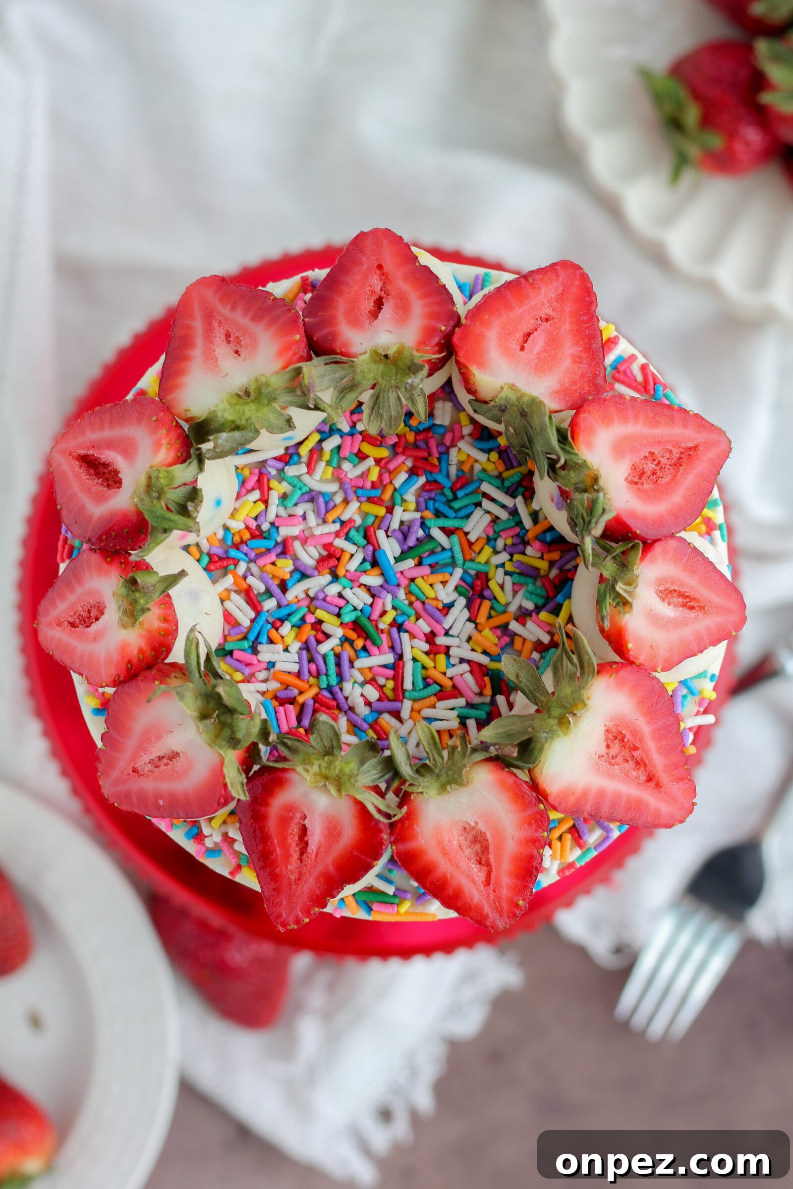 Layered strawberry funfetti cake