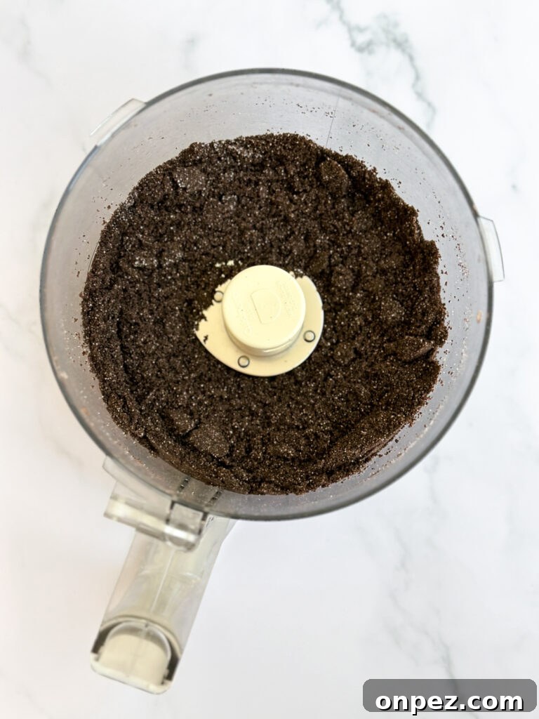 Decadent Chocolate Mint Cheesecake Bars 4 oreo cookies crushed in a food processor.