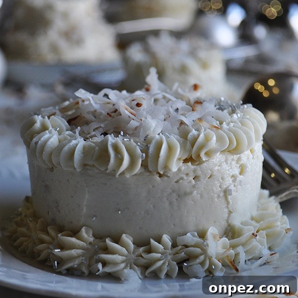 Mini Coconut Cakes with Maple Coconut Italian Meringue 5 A mini Coconut Layer Cake frosted with Maple Italian Meringue Buttercream.