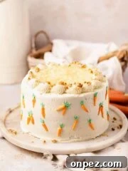 carrot cake with pineapple on cake stand