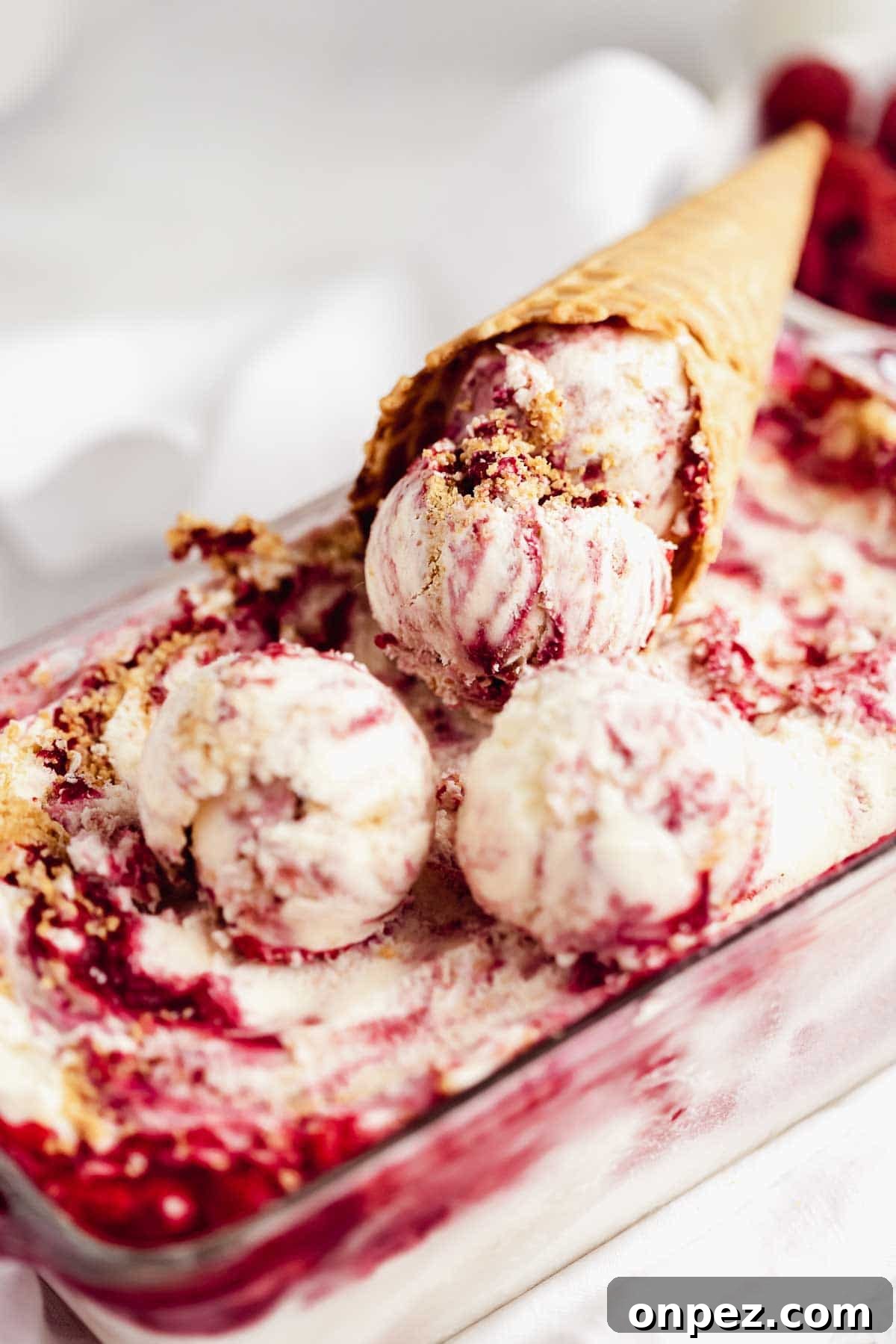 loaf tin filled with raspberry swirl ice cream
