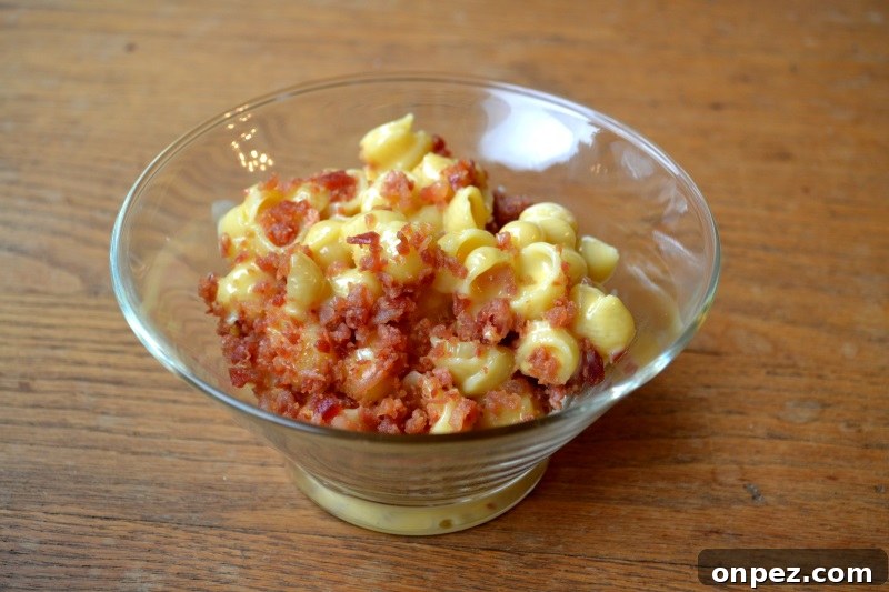 Grandma's Macaroni and Cheese Recipe 3 Grandma's vintage homemade macaroni and cheese topped with bacon in a glass dish