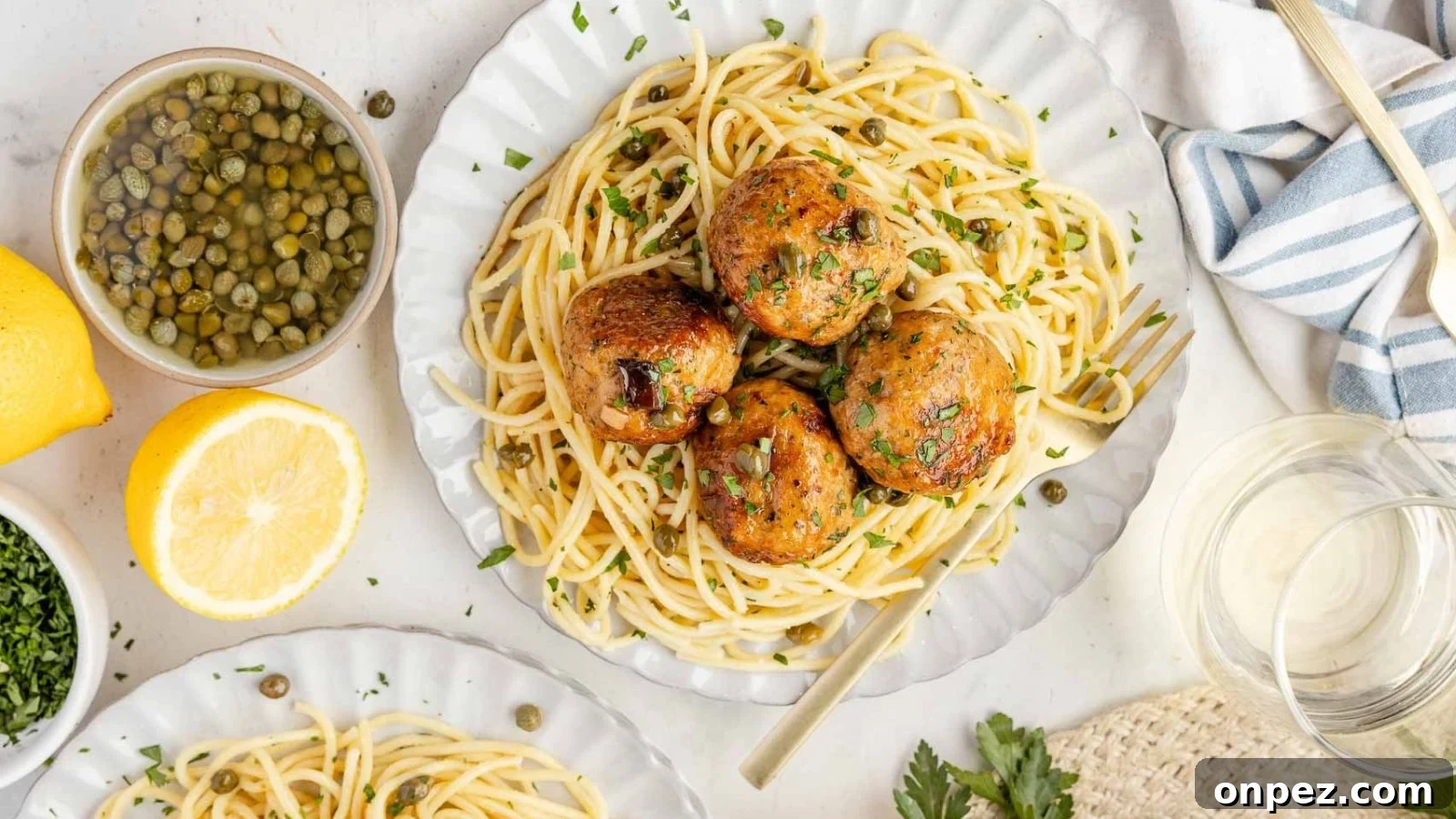 Chicken piccata meatballs in a bright lemon butter sauce.