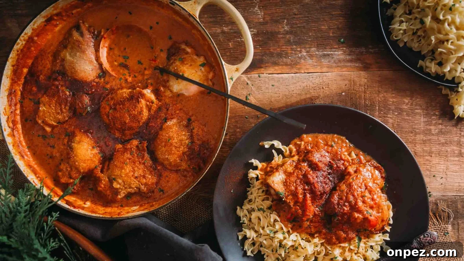 Chicken paprikash simmered in a creamy paprika sauce.