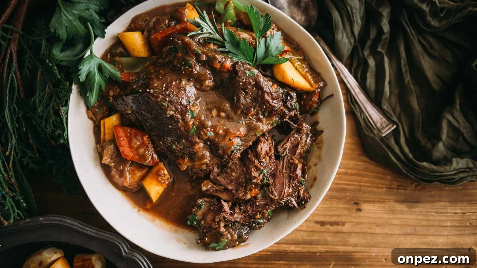 Dutch oven pot roast cooked until tender with soft vegetables.