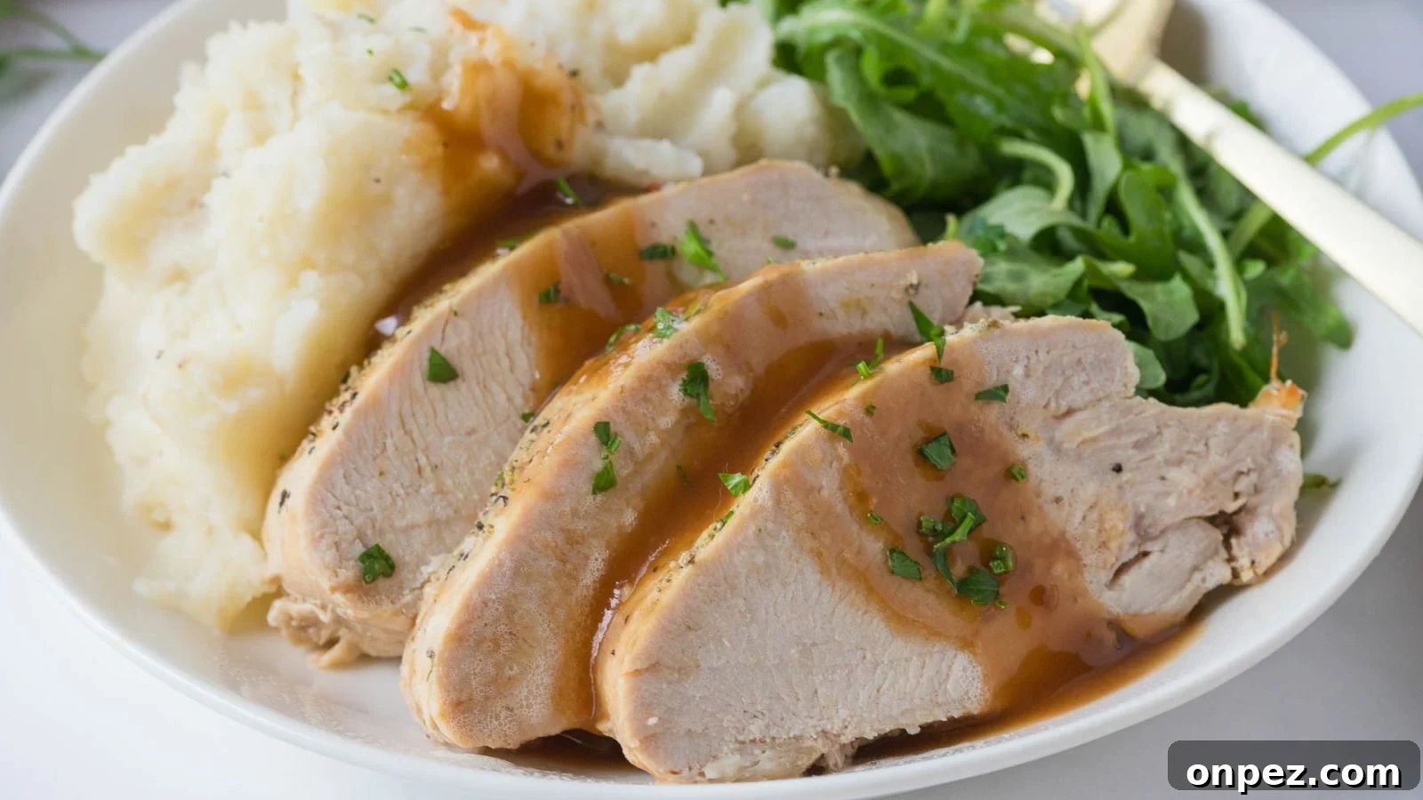 Slow cooker boneless turkey breast cooked juicy with simple seasoning.