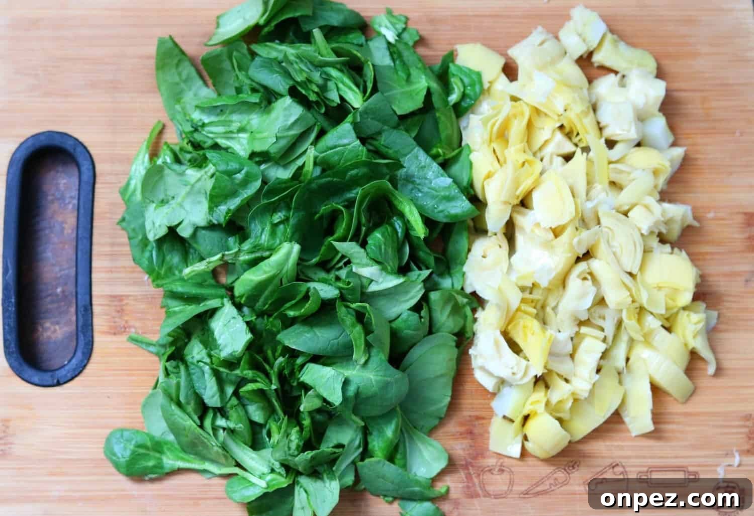 Instant Pot Spinach and Artichoke Chicken 4 Chopped spinach and artichokes on a cutting board