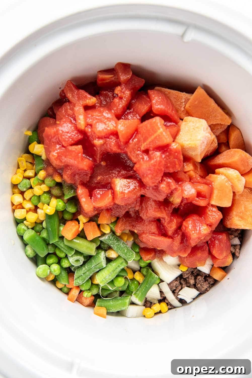 Ground beef, chopped shallot, mixed vegetables, and petite diced tomatoes