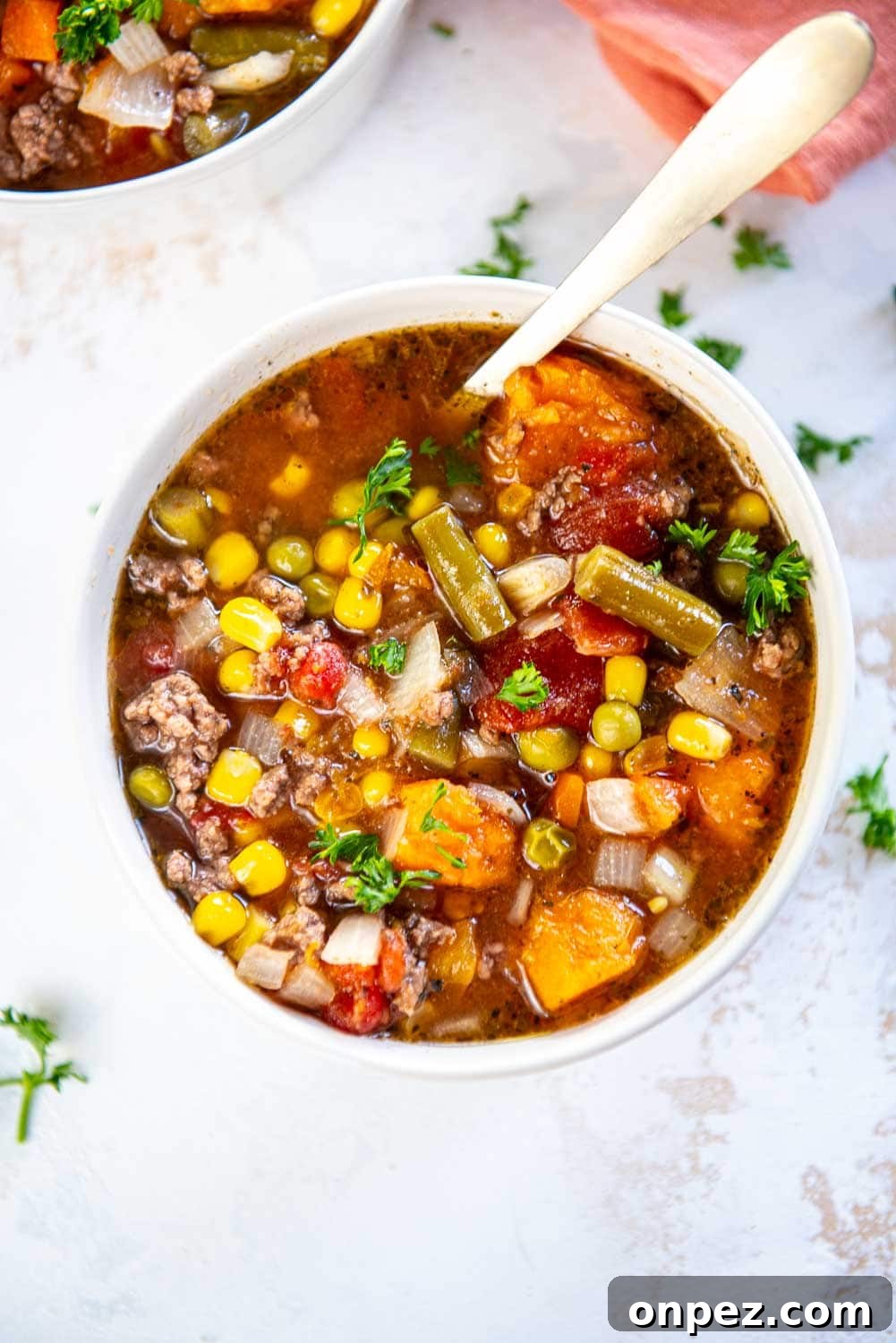 Slow Cooker Hamburger Soup served in bowl with spoon