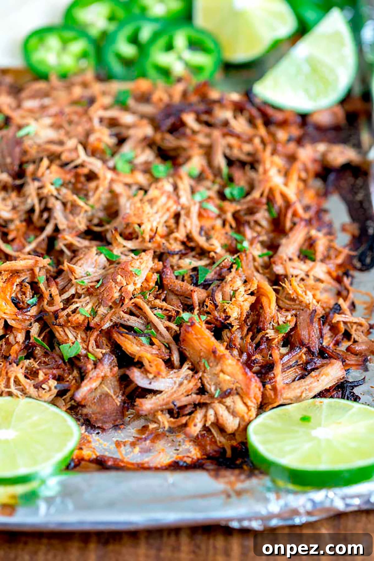 Instant Pot Pork Carnitas Recipe with Crispy Edges 6 A baking sheet filled with Mexican pulled pork