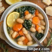 Lemony white bean soup in a bowl.