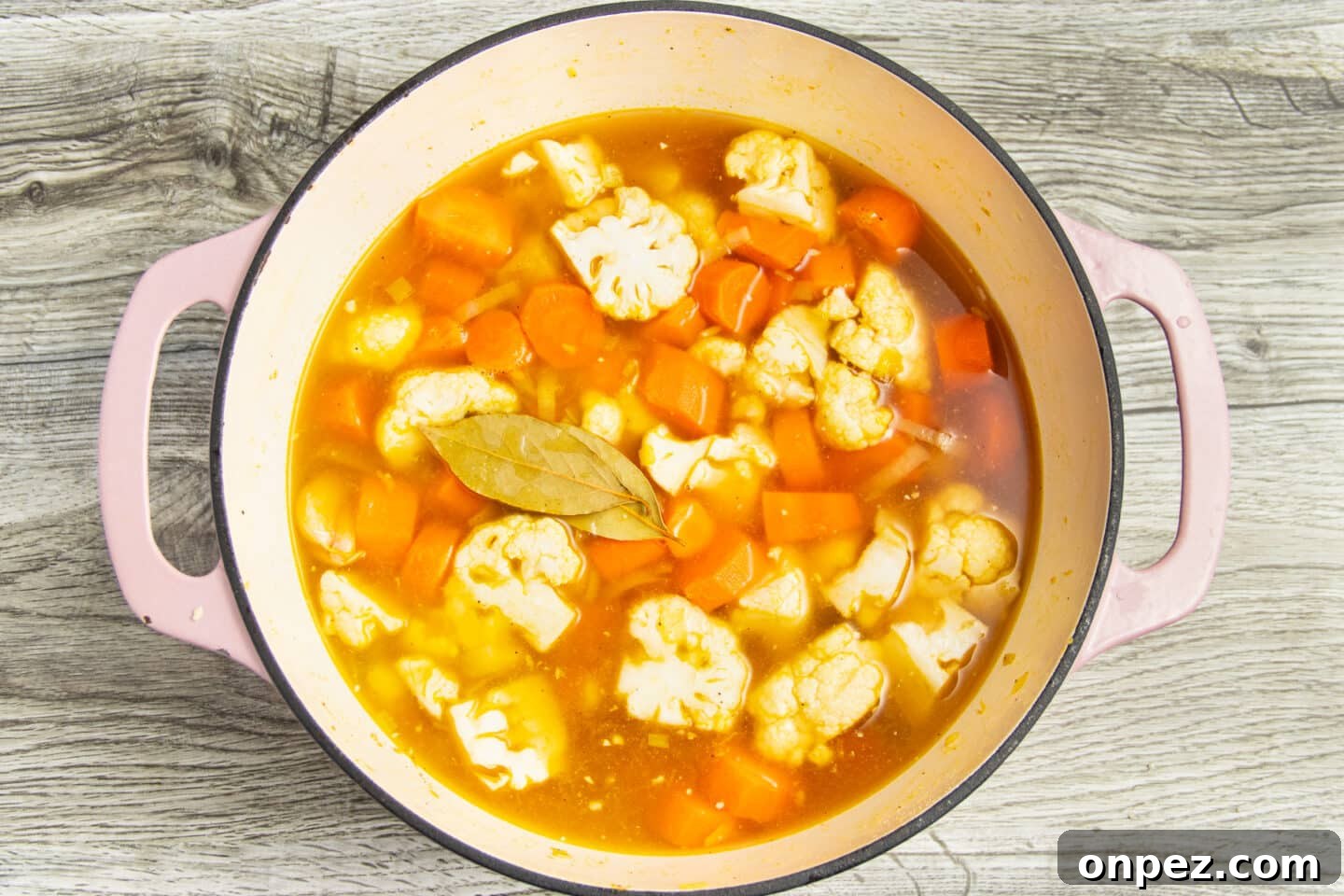 Roasted Carrot and Cauliflower Soup Recipe 6 Pot with the broth added.
