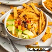 A bowl of creamy chicken tortilla soup.