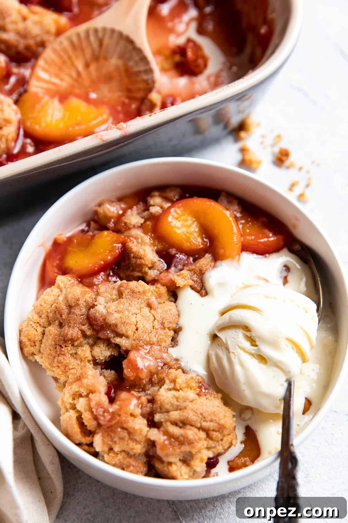 Baked peach cobbler in a dish