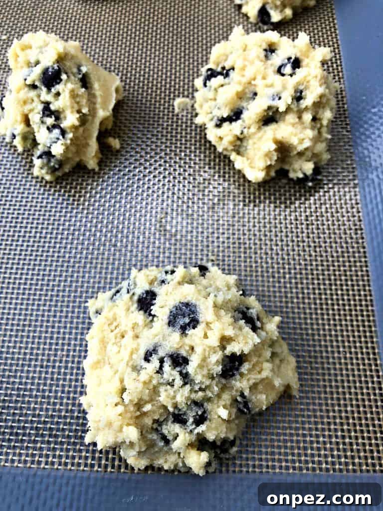 keto chocolate chip cookies on a cookie sheet